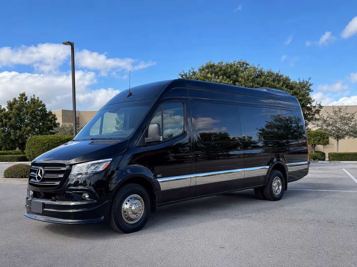 wedding guest sprinter van shuttles from hotel blocks to venues in denton